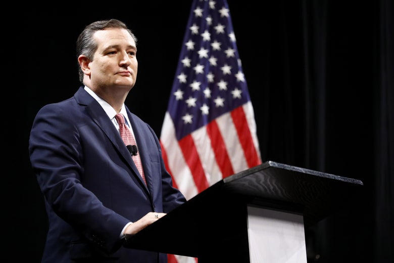 Ted Cruz stands at a podium, and American flag in the background.